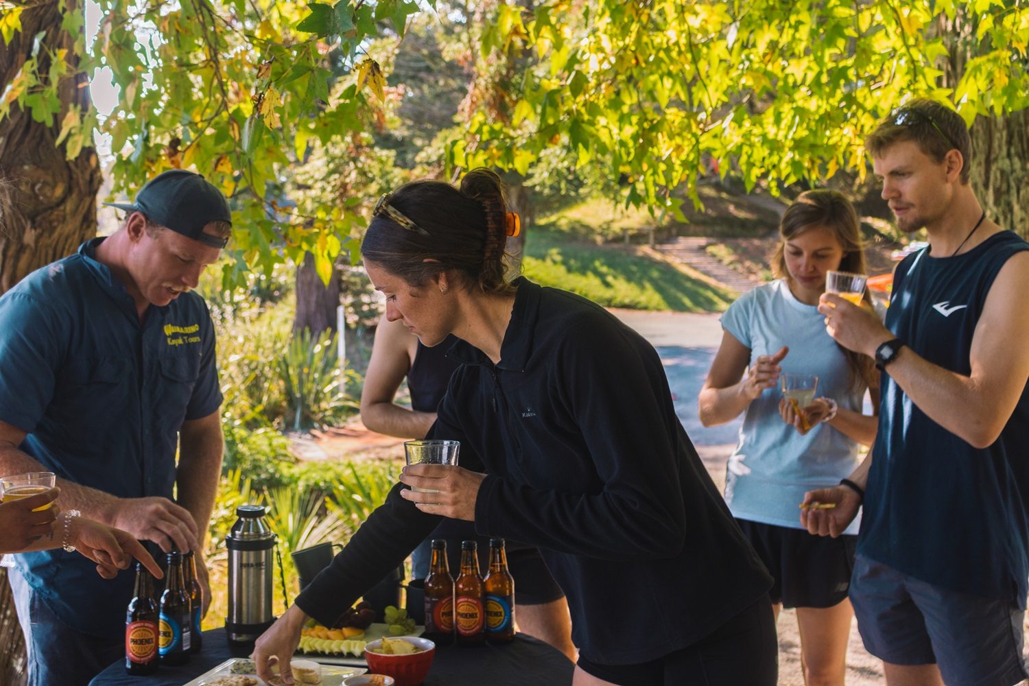 Enjoying refreshments before the Waimarino Evening Glowworm Kayak Tour Tauranga