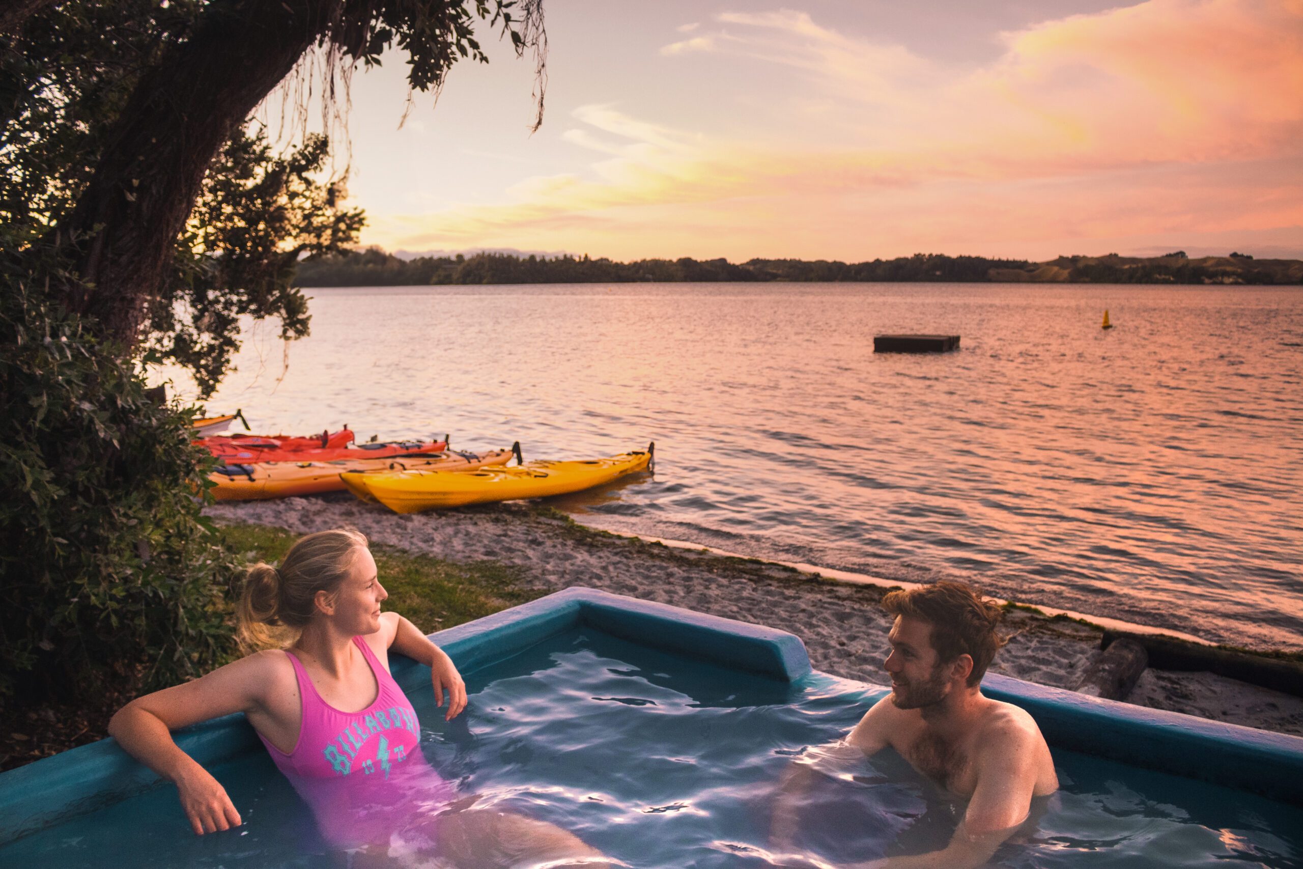 Soaking in the Lake Rotoiti Hot Pools at Sunset
